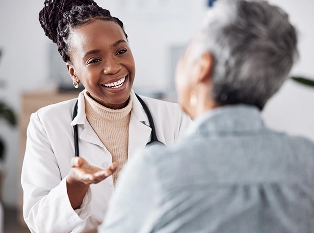Provider talking to her patient