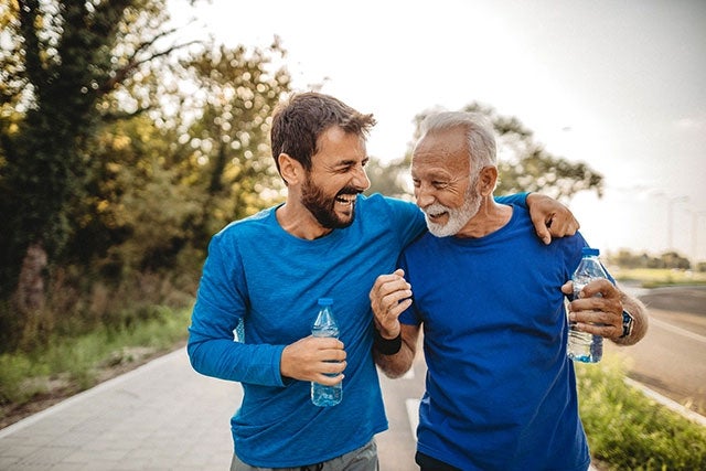 older father and son on a run