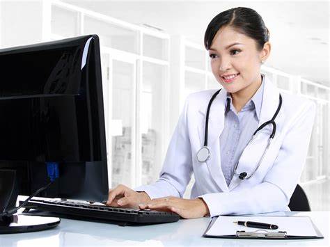 Physician on her computer