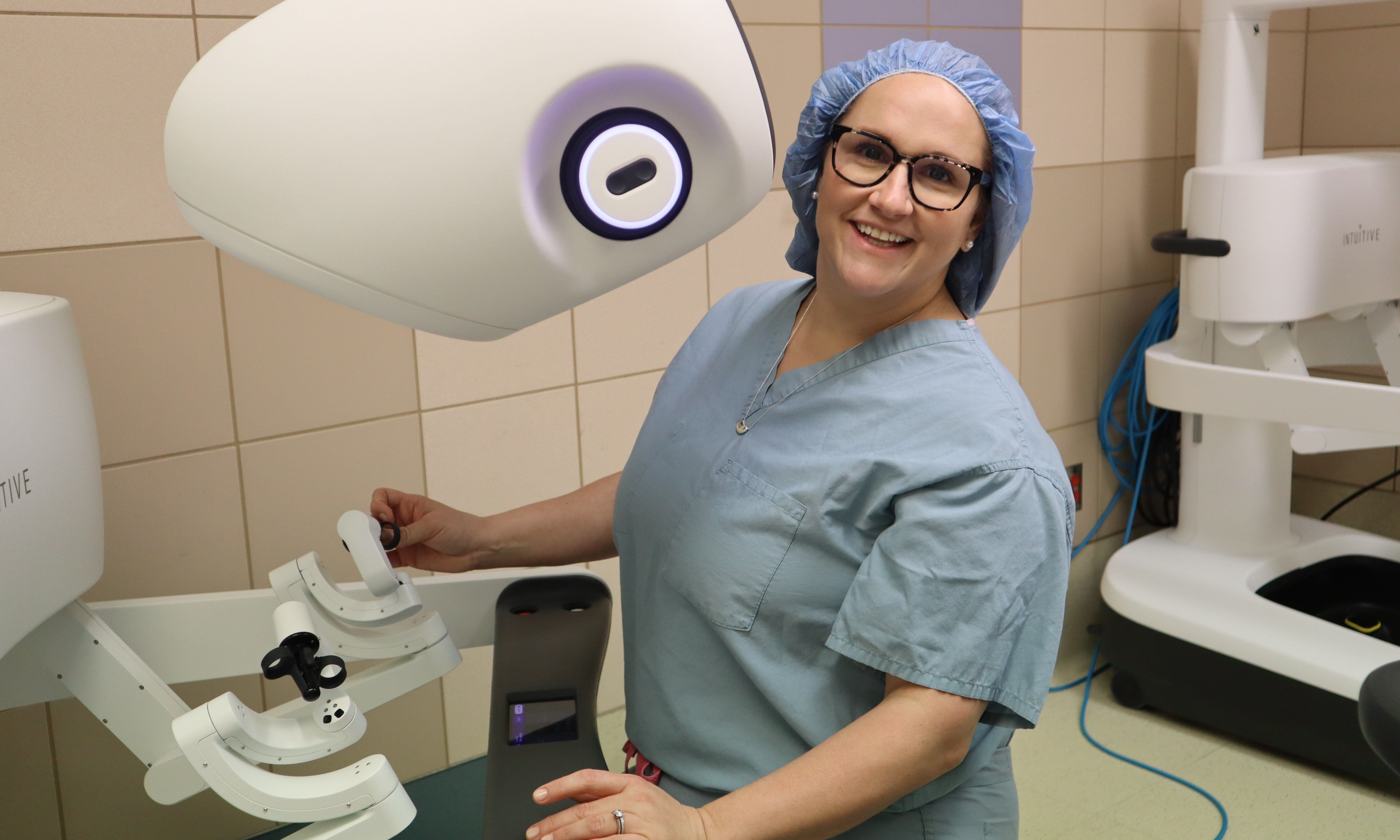 Dr. McClure with Da Vinci 5 Robotic Surgical System
