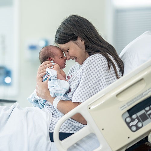 newborn baby with mom