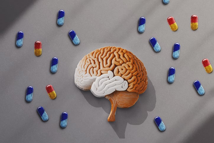 brain surrounded by medications