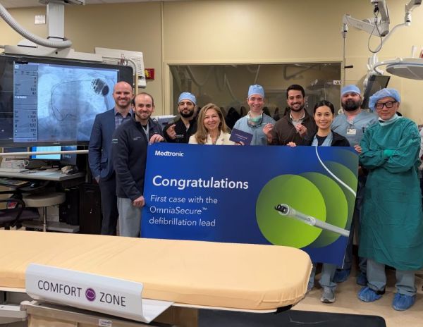 cardiac team with OmniaSecure defibrillation device in the background