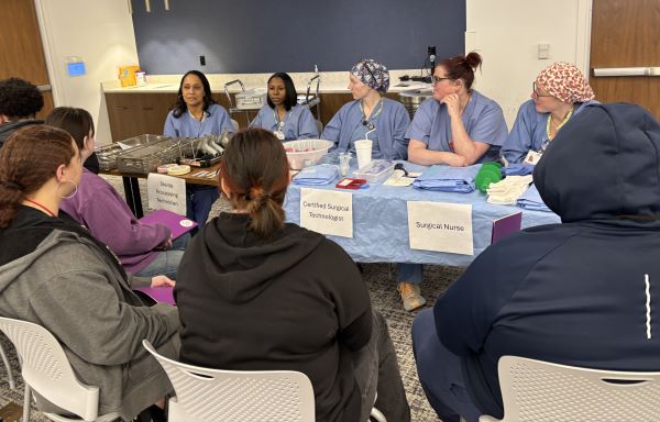 Students learning about health care careers