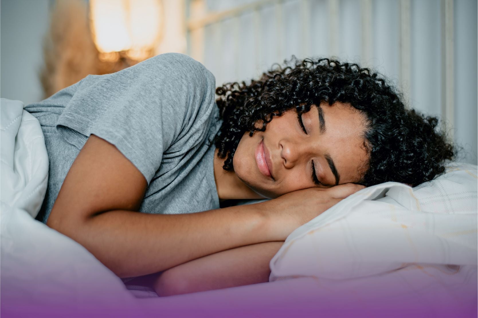 woman sleeping on side resting head on pillow