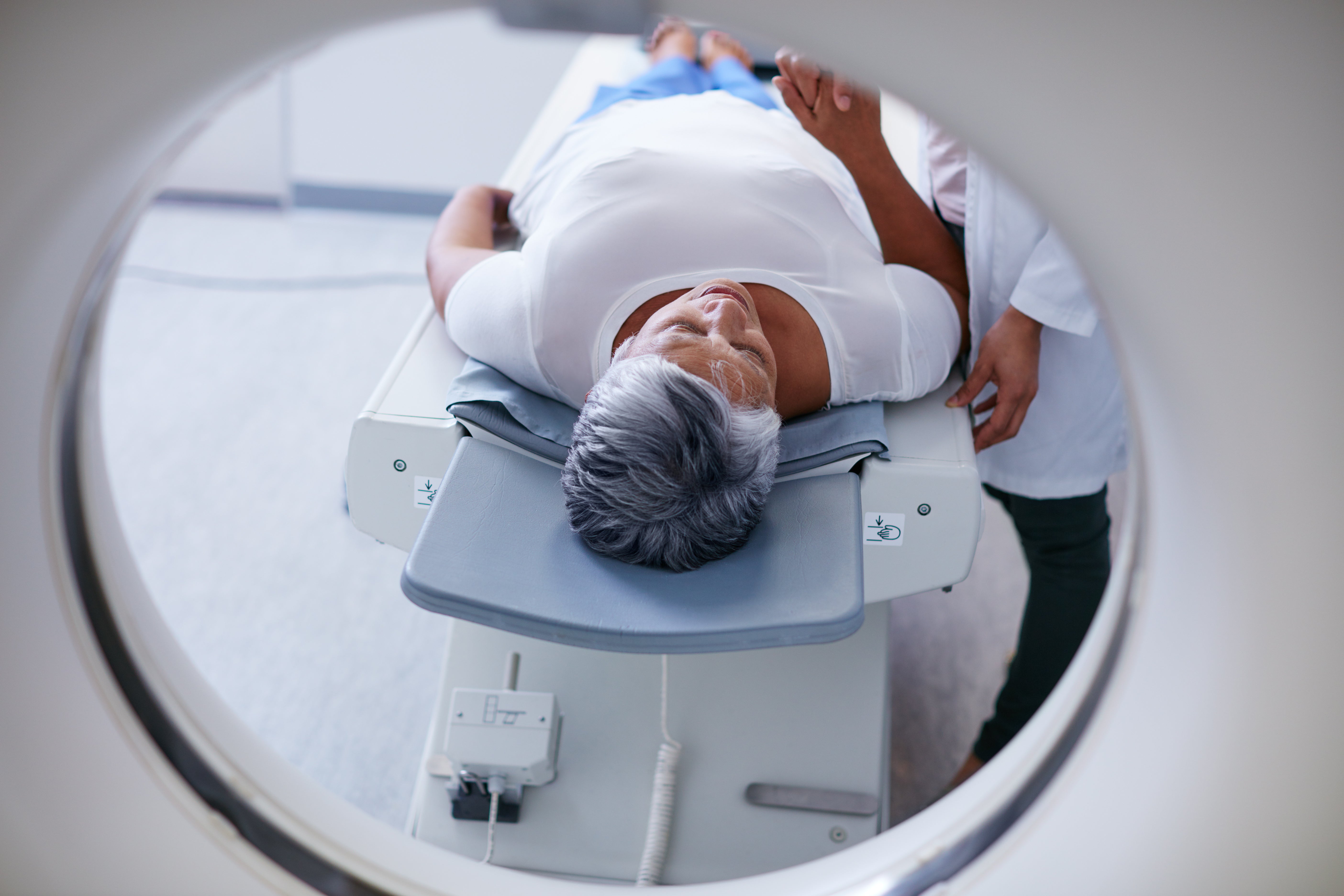 person getting a PET scan